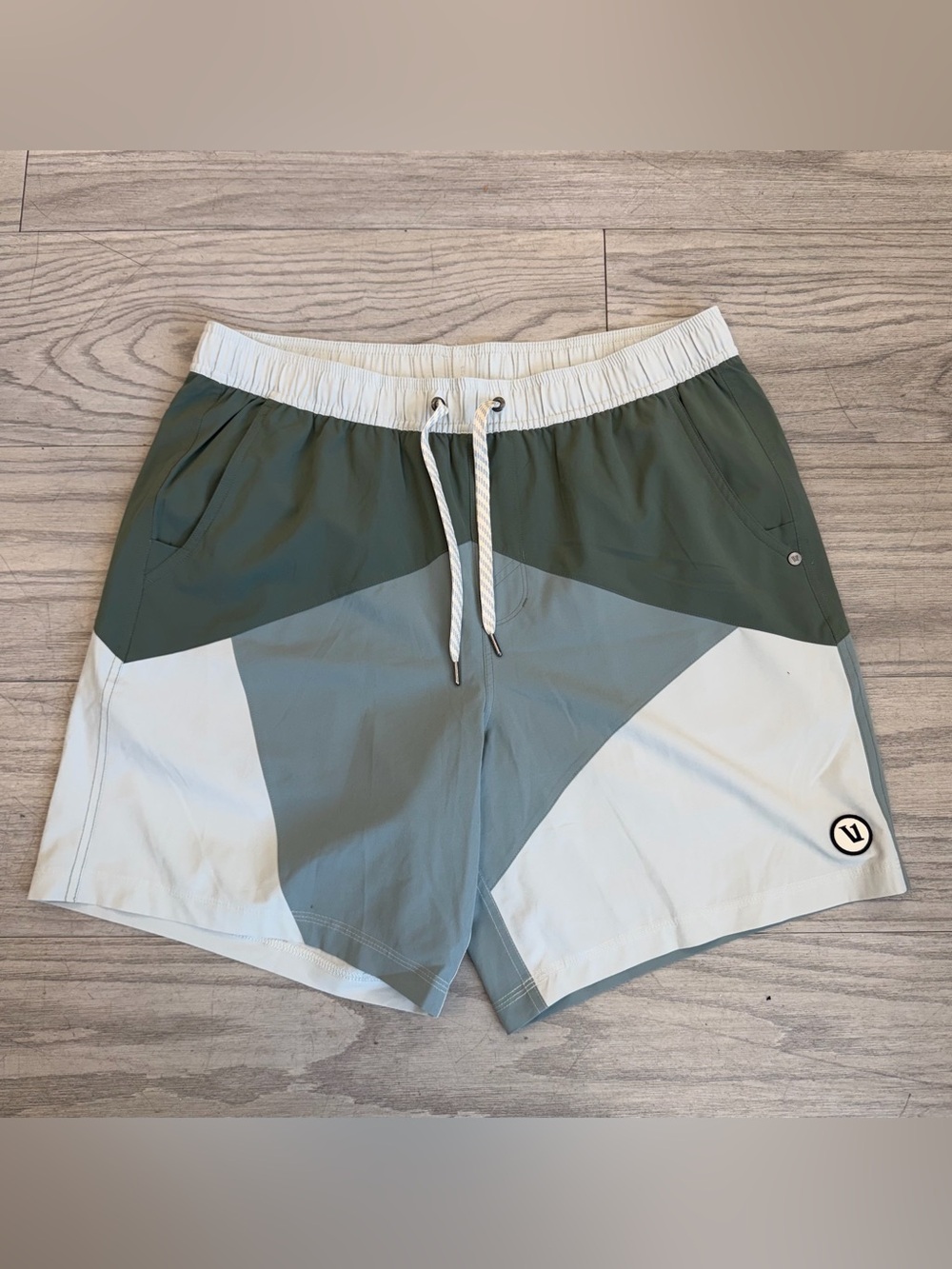 Vuori Men's Colorblock Athletic Shorts in Sage and Cream